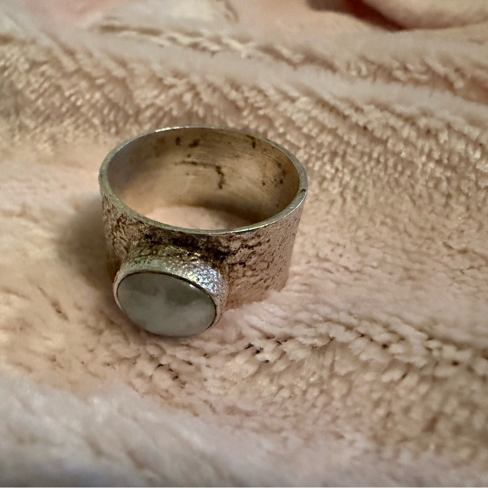 Silver ring with white stone mark 925